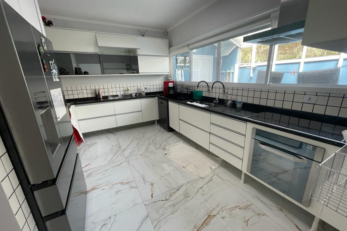 Casa em condomínio 5 suítes